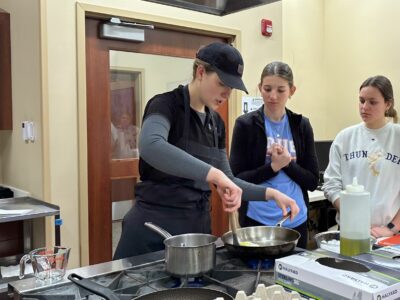 SPICING UP LEARNING: ILLINI WEST HIGH SCHOOL’S INTERNATIONAL CLUB’S GLOBAL COOKING JOURNEY AT MEMORIAL HOSPITAL’S HEALTH & WELLNESS TEACHING KITCHEN